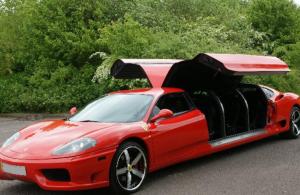 stretchredferrariamericancoachlimo_1.jpg