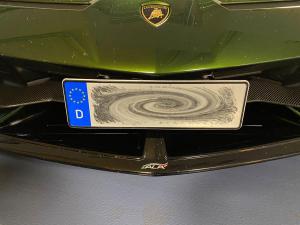 Aventador-Kennzeichen_5874.thumb.jpg.1296d11f40c0dceb76b87a7164da92e6.jpg