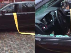 28987000-zu-sehen-sind-die-eingeschlagenen-scheiben-eines-autos-durch-dessen-innenraum-ein-feuerwehrschlauch-verlegt-wurde-2wrRxQ0YYSe9.jpg